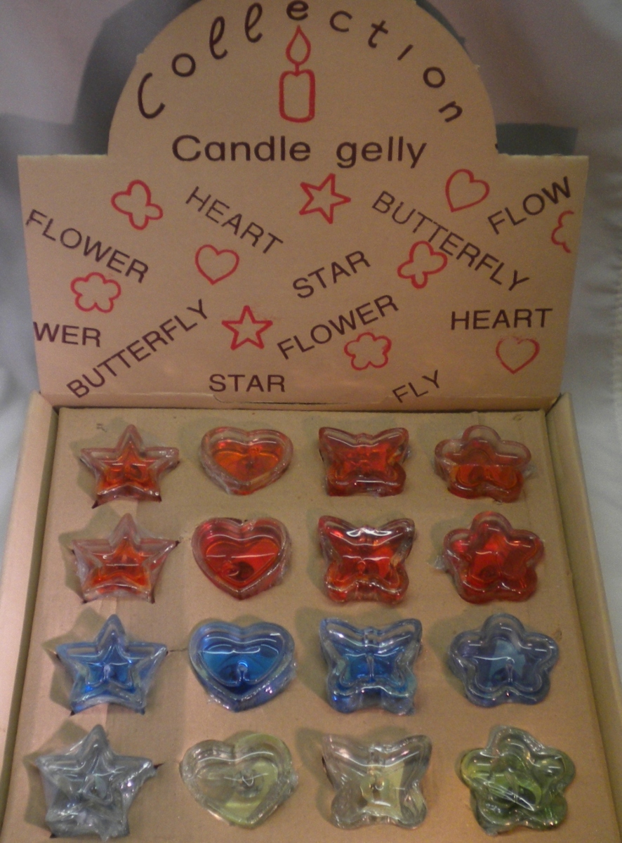 Display Of 16 Gel Candles Assorted Shapes - Unit Of 16 Candles - MSRP $2.99 Each - U Pay $.60 Each