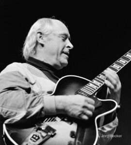 Attila Zoller playing guitar