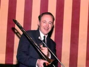 Chris Barber holding a trombone