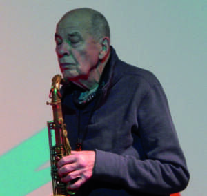 Heinz Sauer holding a saxophone