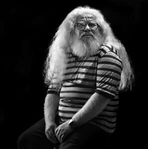 Hermeto Pascoal seated for a portrait