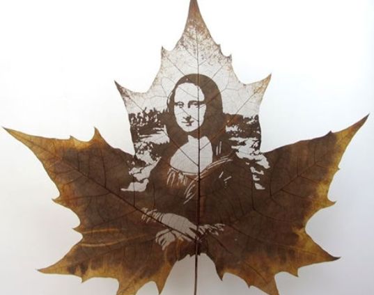 Autumn leaf art shaped like the Mona Lisa