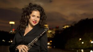 Anat Cohen holding a clarinet