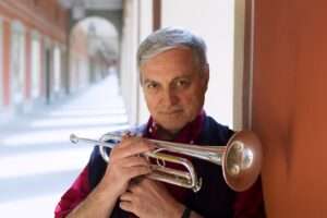Dusko Goykovich holding a trumpet