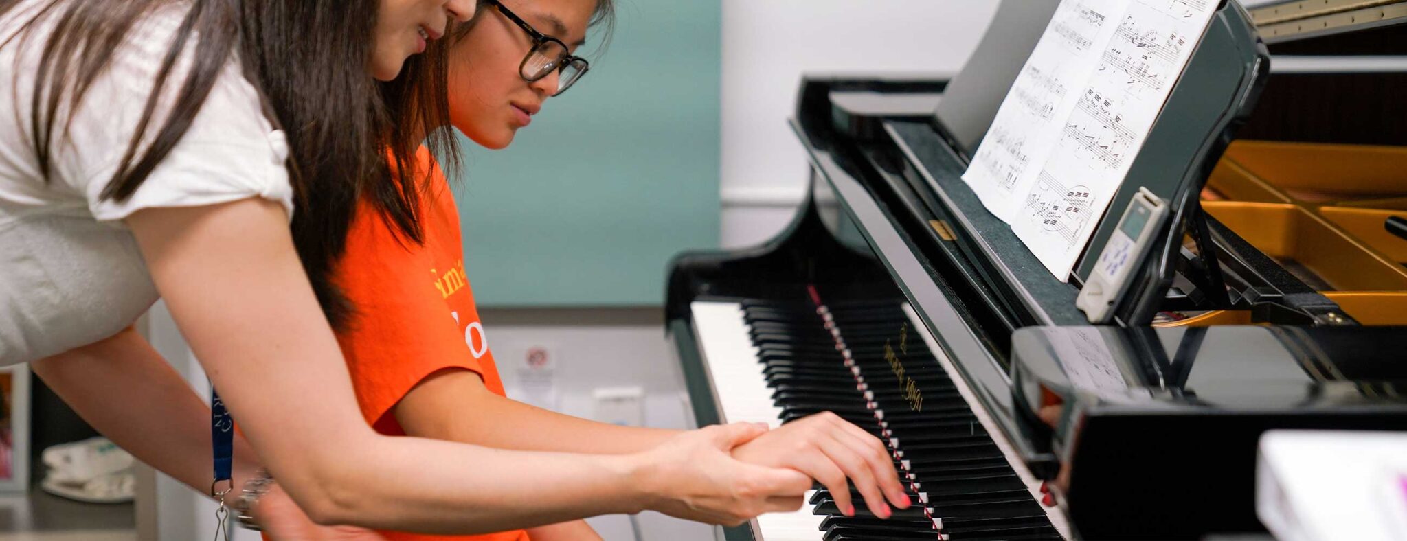 Piano student at the keys