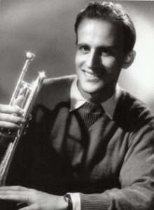 Boris Vian holding a trumpet