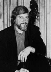 Don Thompson seated in a black and white portrait