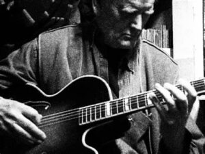 Derek Bailey playing guitar