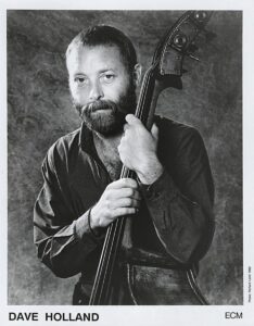Dave Holland holding a double bass