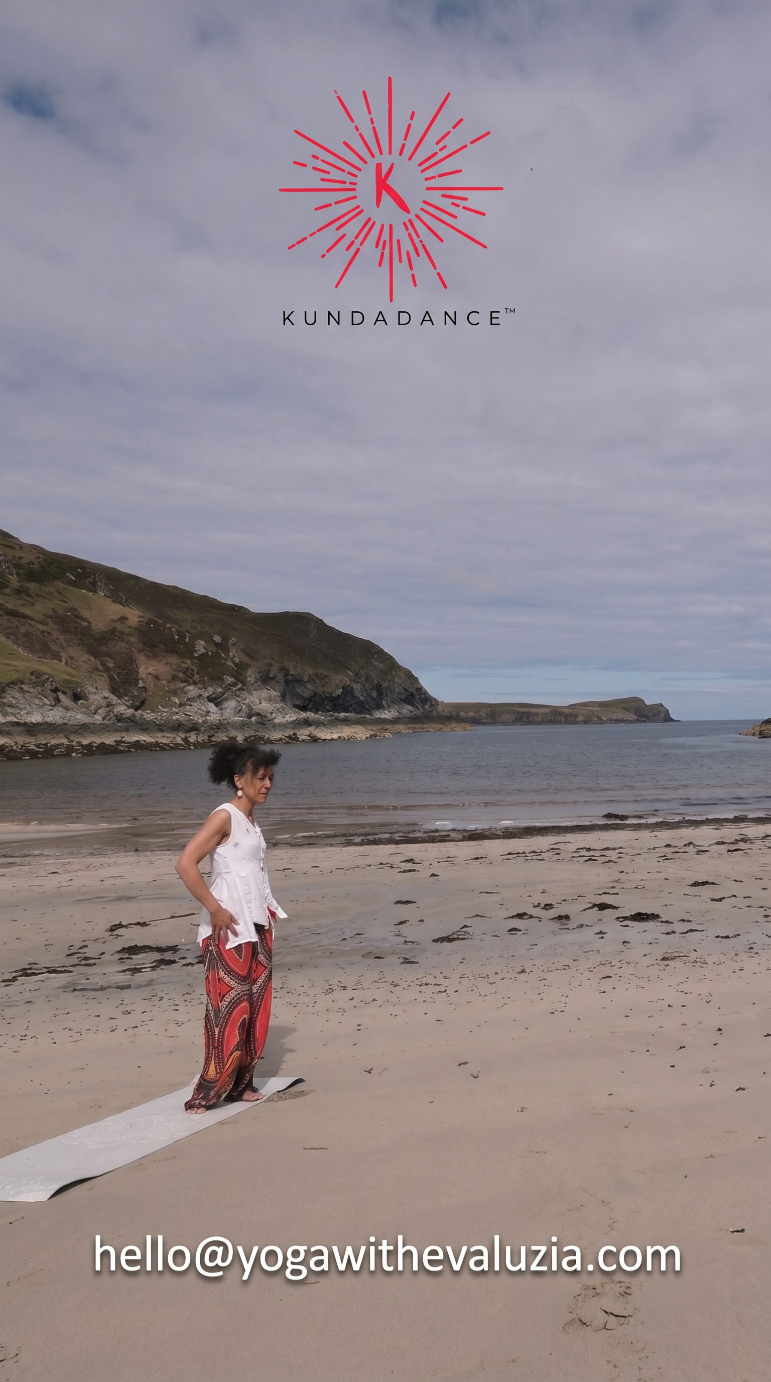 Eva Luzia practicing yoga on the beach