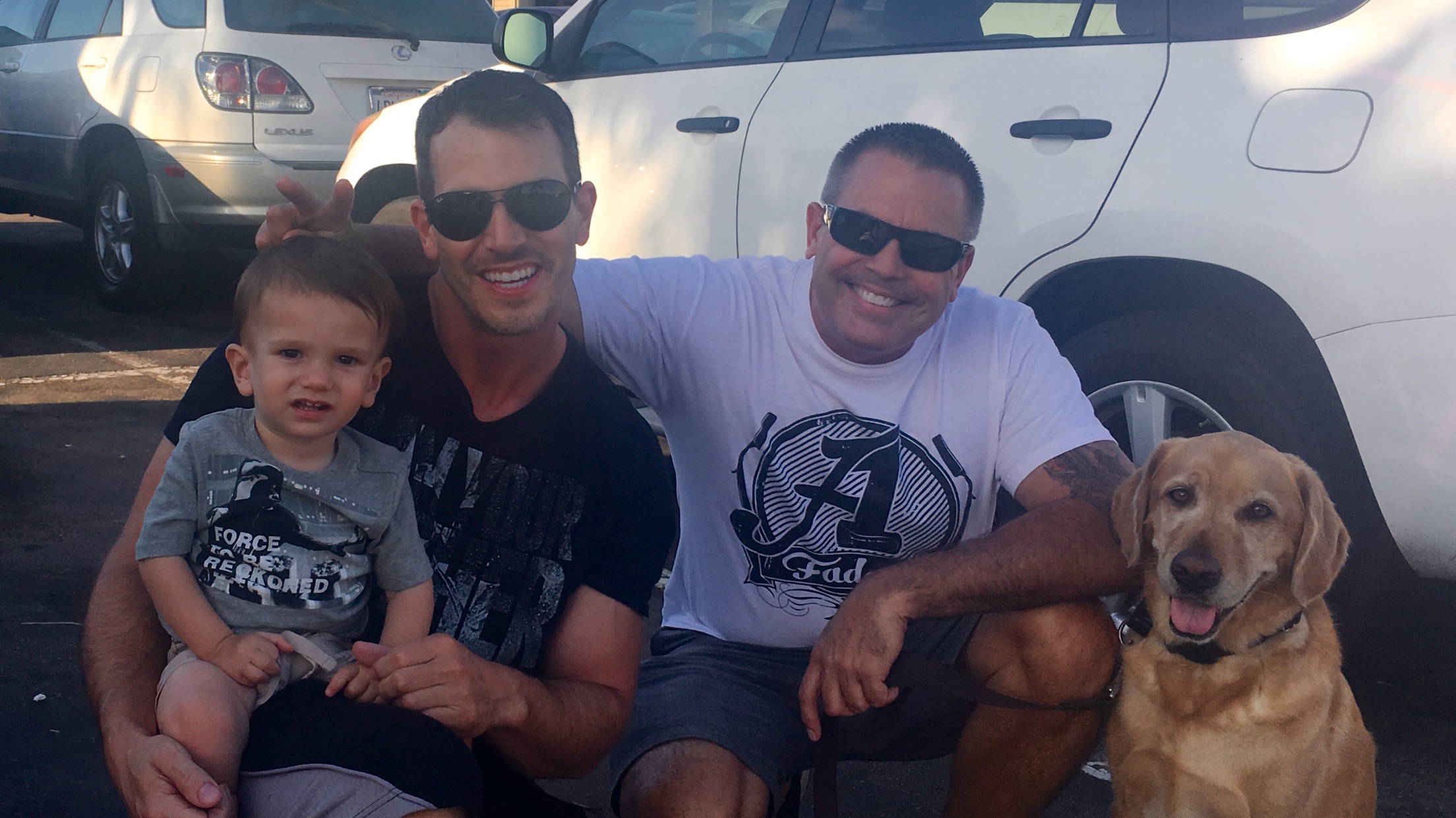 Brock with family in a casual outdoor setting