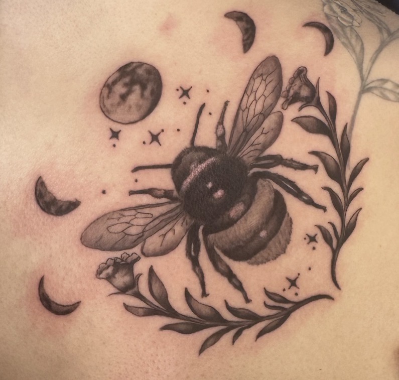 Bee and moon tattoo by Marc Cabos.
