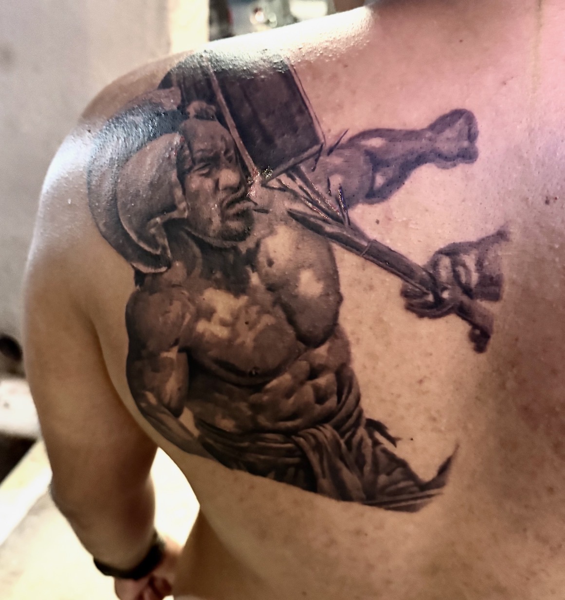 Warrior chest tattoo by Marc Cabos.