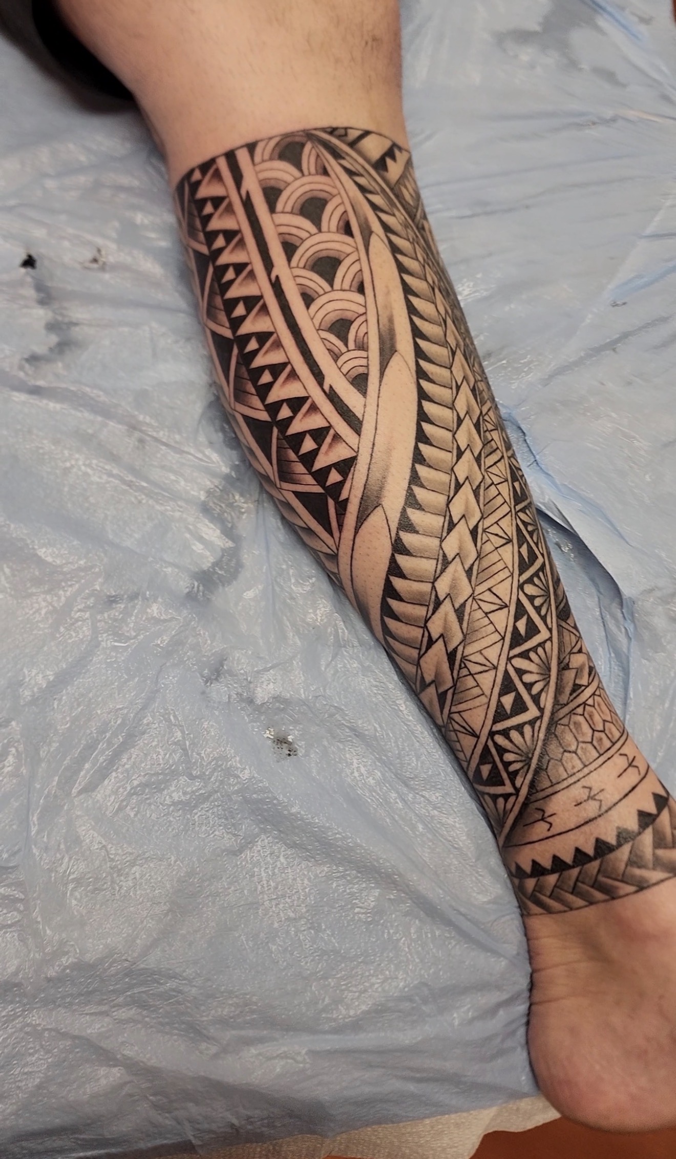 Polynesian forearm sleeve tattoo by Marc Cabos