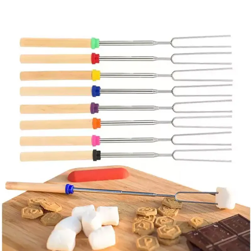 Set of colorful-handled telescoping stainless steel marshmallow roasting sticks with s'mores ingredients