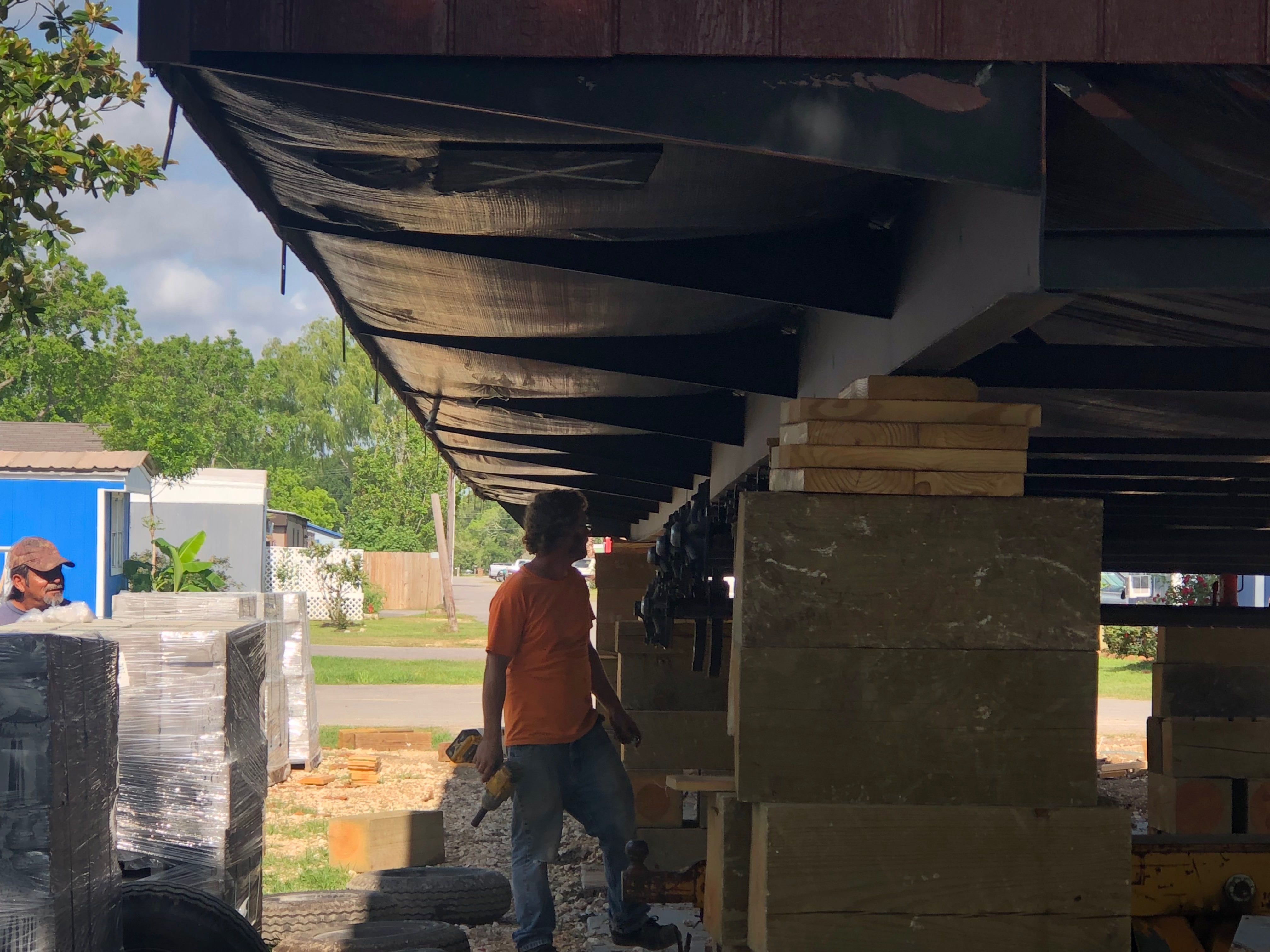 Mobile home setup and installation crew at work