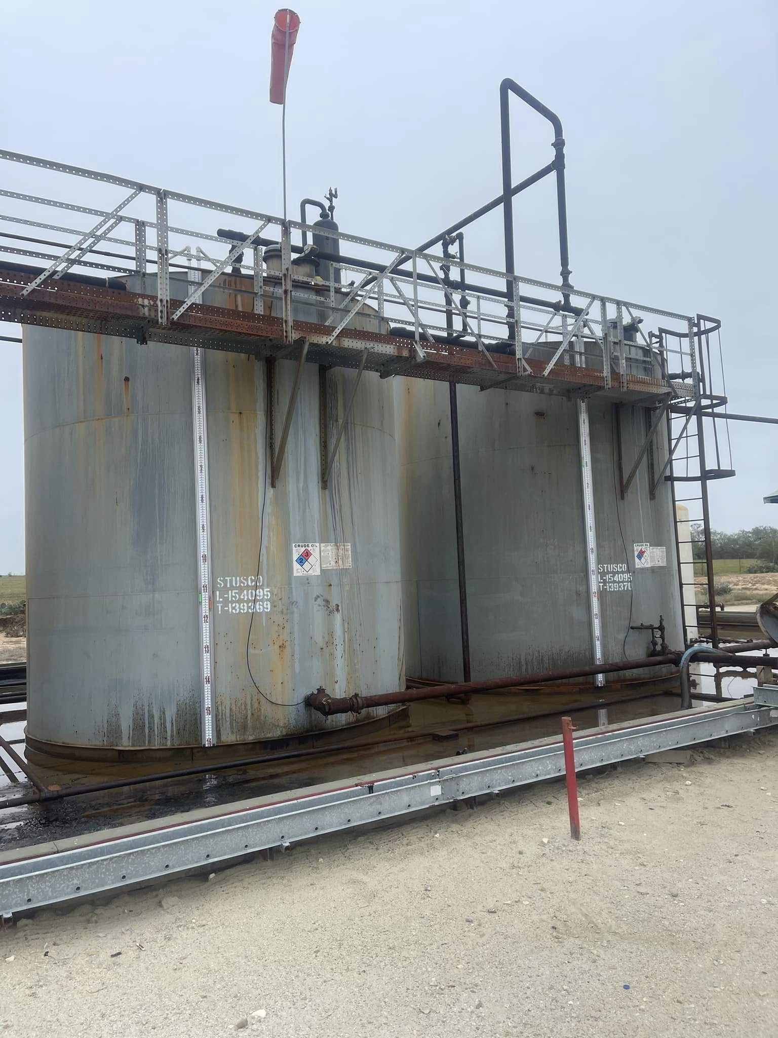Crude Oil Tank Battery with External Gauge — STUSCO Field Installation