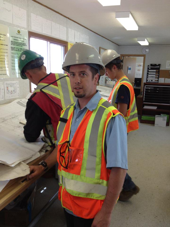 Darren Dyck in professional safety gear at a construction site office