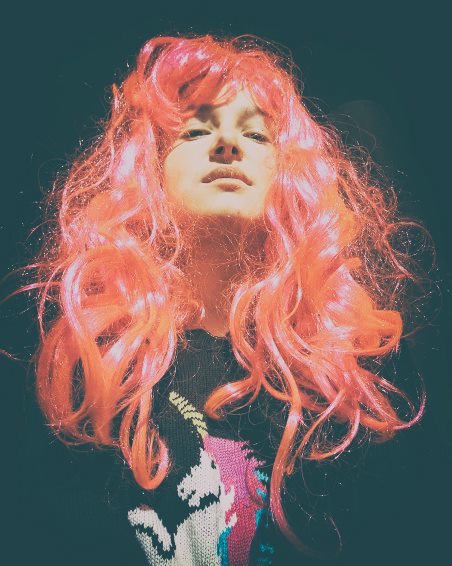 BoryaXYZ in a playful pink wig