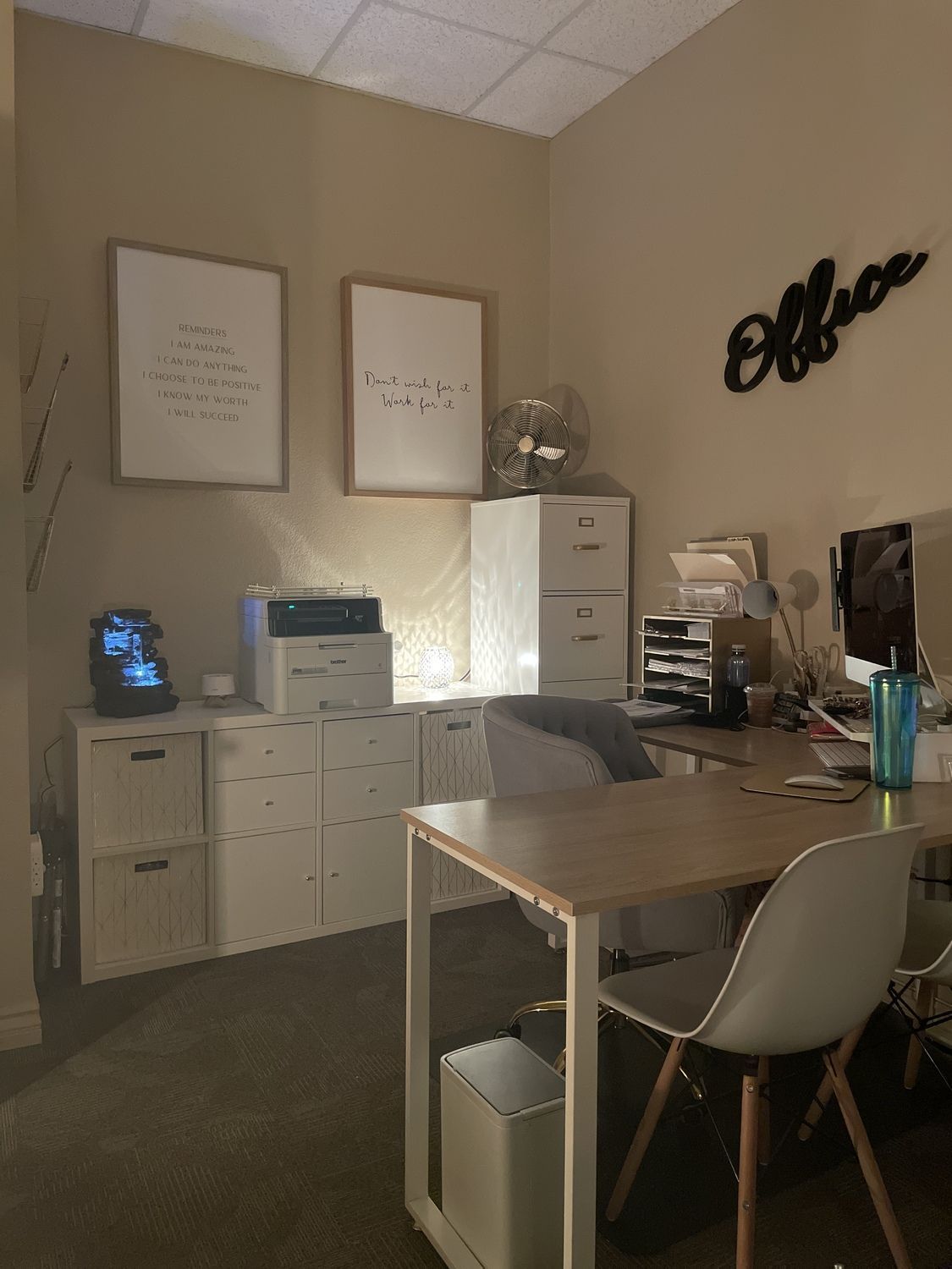 Feeling & Healing Counseling office workspace with motivational posters