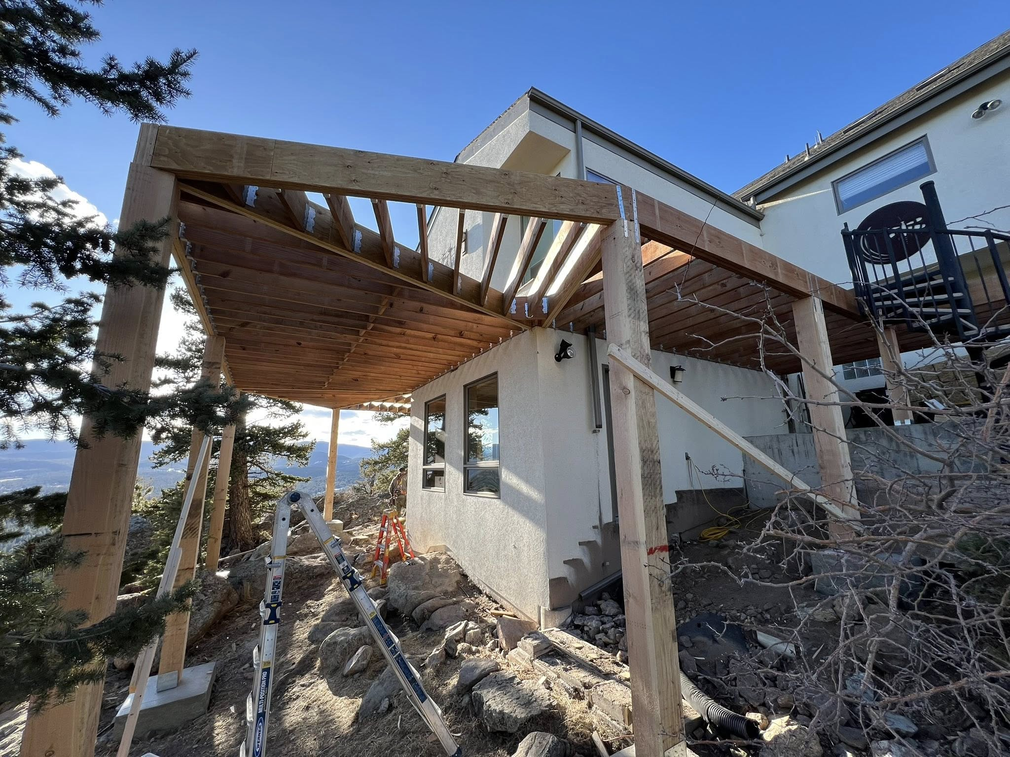 Mountain patio cover framing with panoramic views