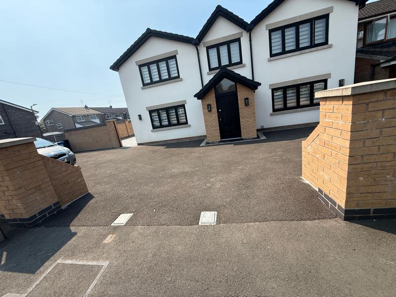 Completed exterior project showing brickwork, a path and an outdoor area