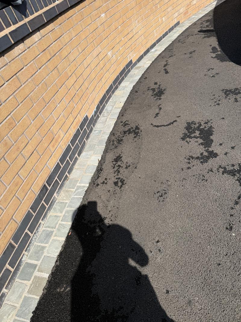After photo of an exterior path and edge area