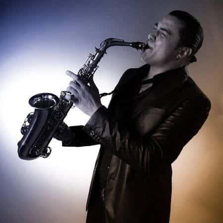 Saxophonist performing with a saxophone