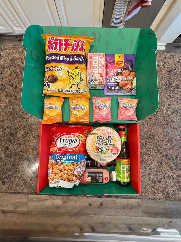 A closer view of products arranged in a green 99 Ranch Market gift box