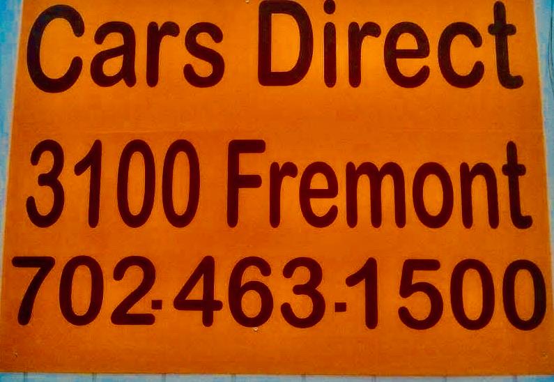 Orange Cars Direct sign listing 3100 Fremont and the phone number 702-463-1500.